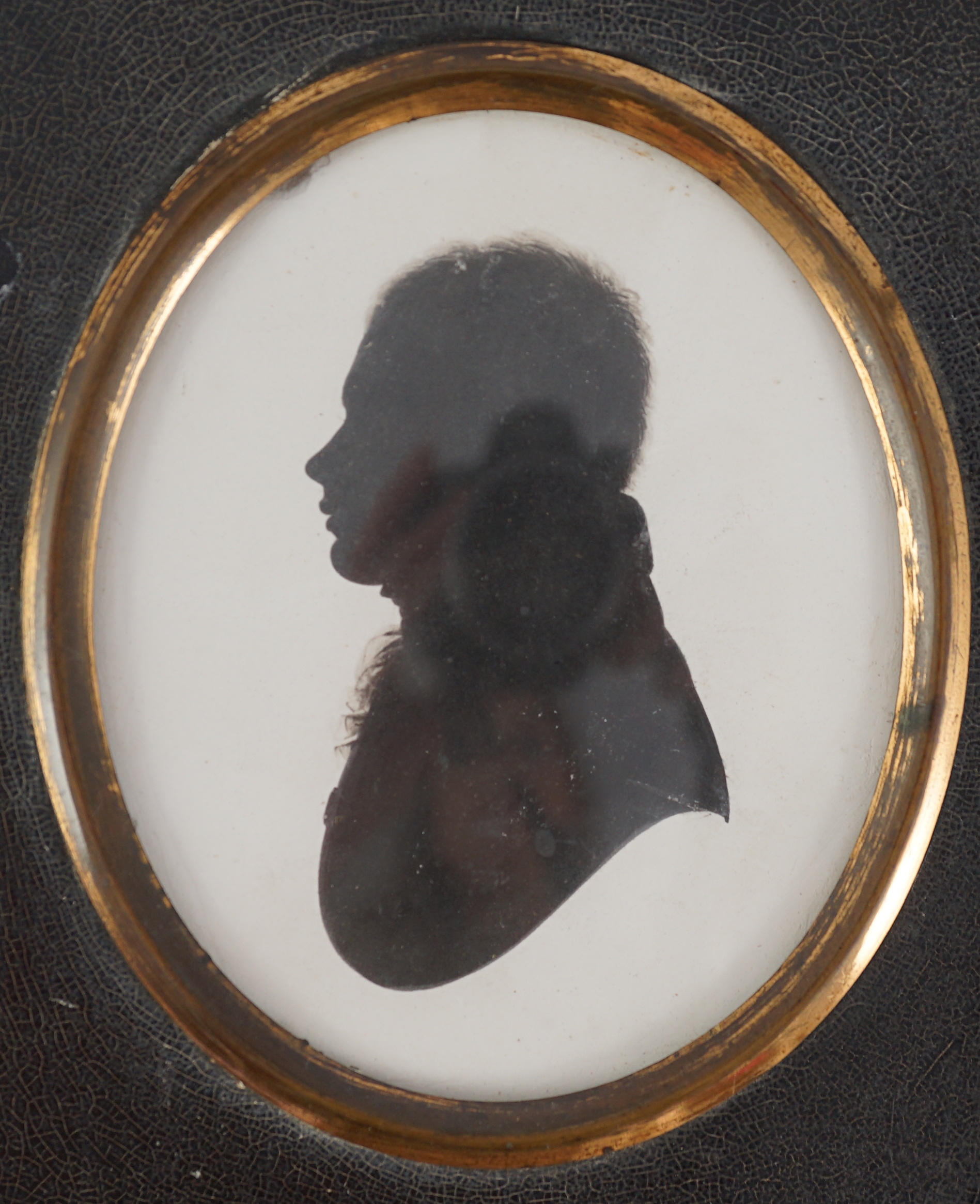 John Miers (1756-1821), Silhouette of a gentleman, painted plaster, 8 x 6.5cm.